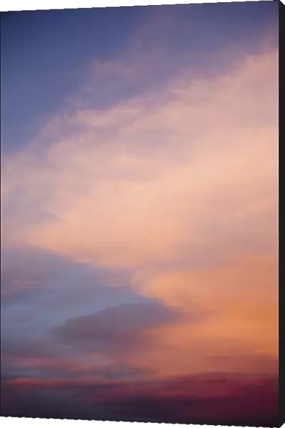 USA, New Mexico. Red colored clouds at sunset in northern New Mexico