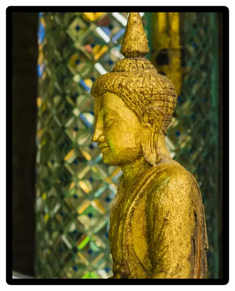 Myanmar. Yangon. Sule Pagoda. Old Buddha statue in profile
