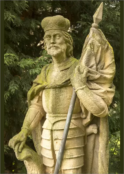 Czech Republic, Bohemia, Lany. Stone statue of the flagbearer outside Lany Castle