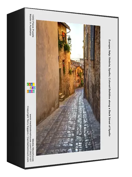 Europe; Italy; Umbria; Spello; Colored Buildins along a Back Street of Spello