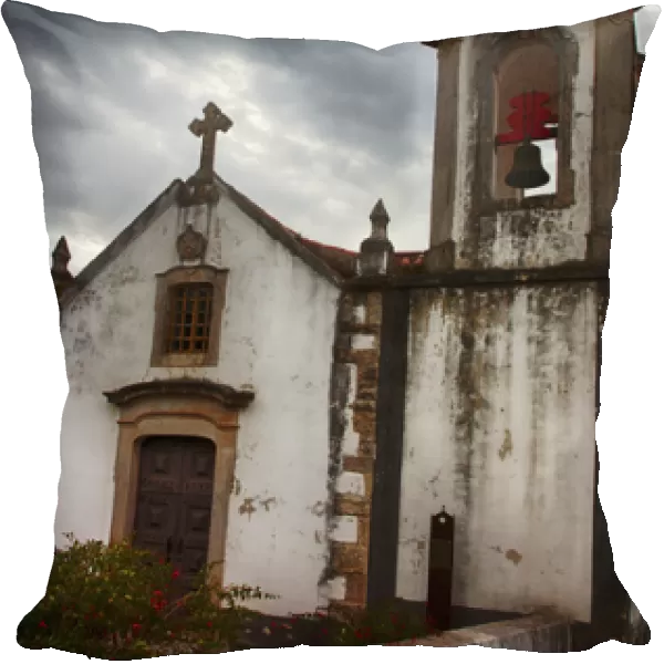 Europe; Portugal; Obidos; Igreja de Sao Pedro Church, Obidos with clouds above