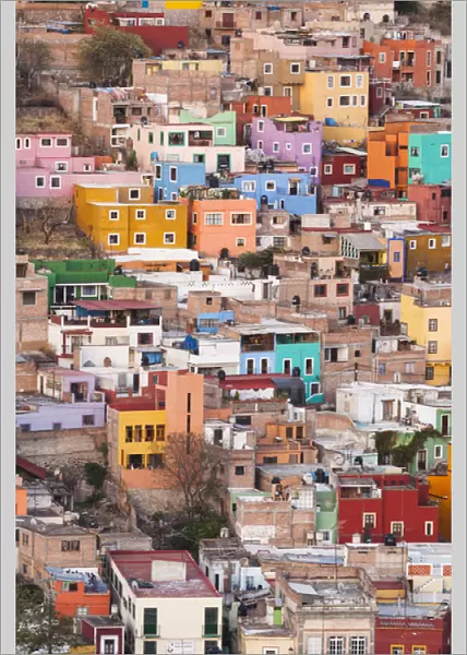 Mexico, Guanajuato. Colorful homes perch on the hillside of this Mexican town