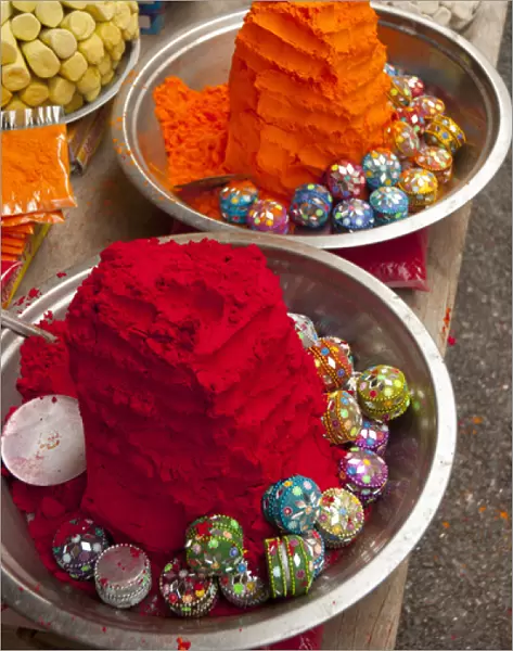 Bright red and orange tikka powder, Pushkar, Rajasthan, India