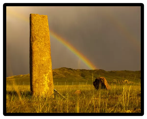 Rainbow over Deer stones with inscriptions, 1000 BC, Mongolia