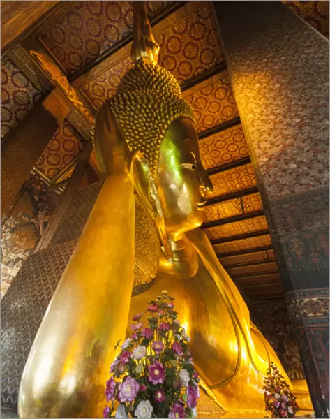 Thailand, Bangkok. Reclining Buddha inside Wat Pho