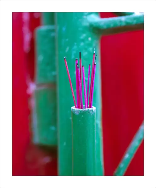 Incense sticks outside a home in Hoi An, Vietnam