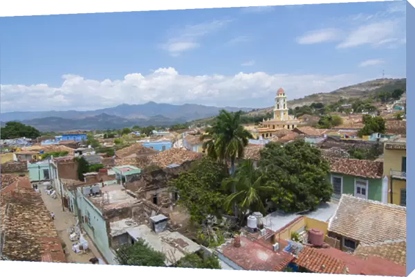 Trinidad Cuba from above tower with church and mountains with buildings of tile roofs