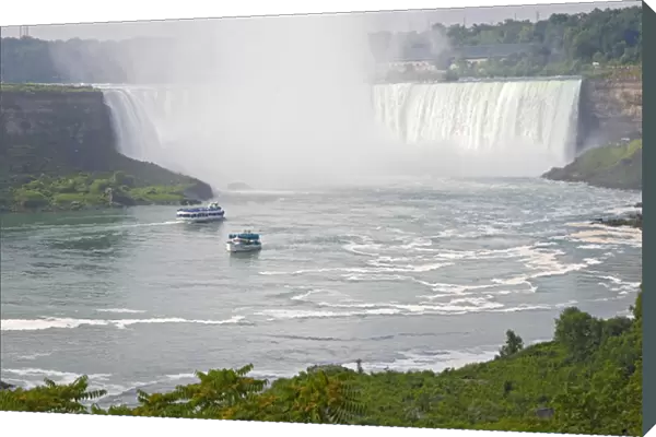 Canada, Ontario, Niagara Falls. Maid of the Mist and another sightseeing boat with
