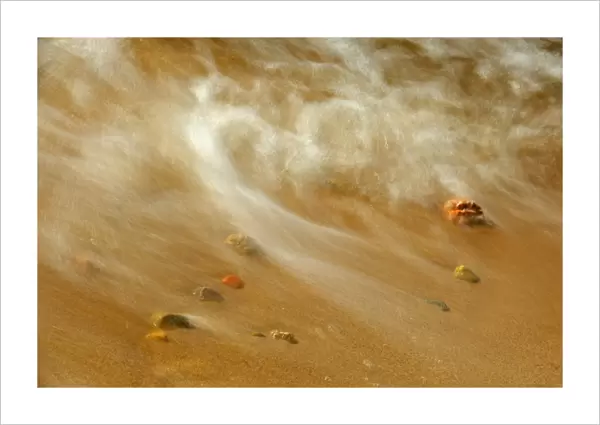 Canada, Ontario. Waves crashing against pebbles on shore of Lake Nipissing. Credit as