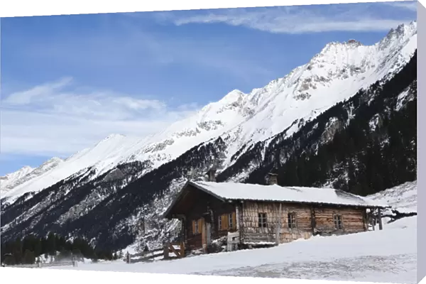Mountain hut or alpe during winter in the National Park Hohe Tauern in Austria. Europe