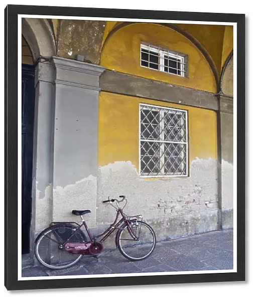 Europe; Italy; Lucca; City Scene of bicycle and Arched Buildings