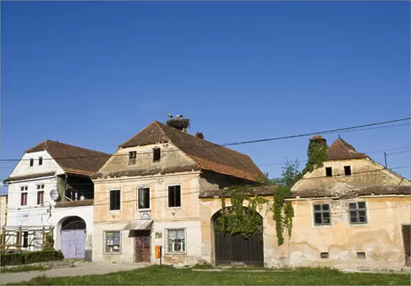 Old buildings in Prejmer (Tartlau) in Transsilvania with stork nest Europe, Eastern Europe