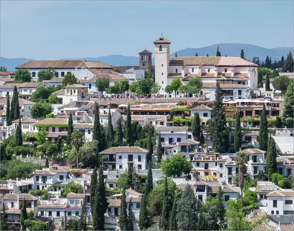 Spain, Andalusia. Granada. VIew from the Alhambra gardens across town to the mirador