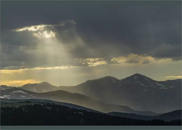 USA, Colorado, Mt. Evans. Landscape of virga rain and God rays