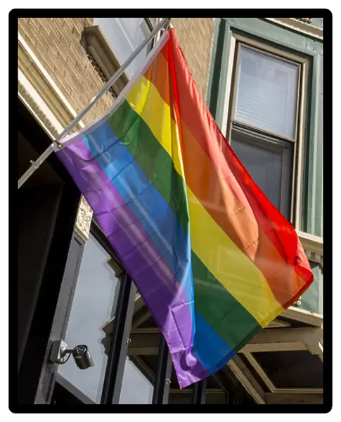 Colorful rainbow flag on Halsted Street in Boystown the gay neighborhood