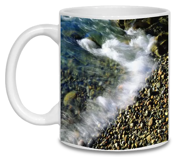 USA, Maine, Waves breaking on a Rock Background