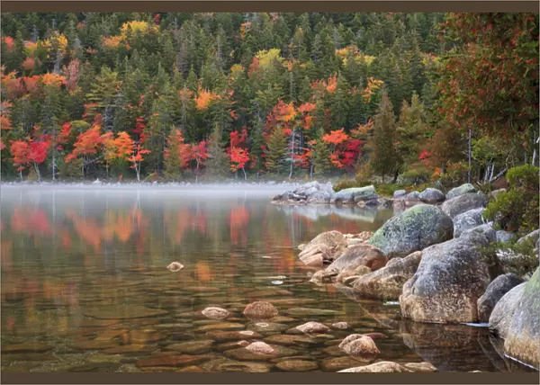 USA; North America, Maine; Acadia National Park; Fall reflections with fog at Jordon pond