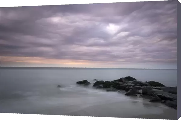 USA, New Jersey, Cape May National Seashore. Sunrise on stormy beach landscape. Credit as