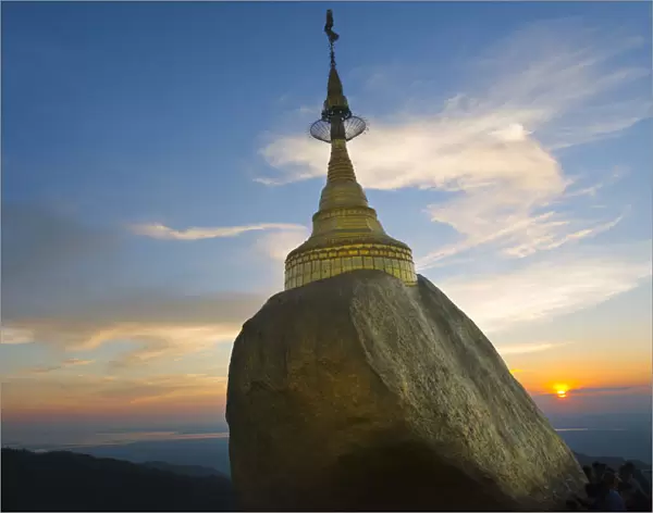 Kyaiktiyo Pagoda (Gold Rock) at sunset, a small pagoda built on the top of a granite