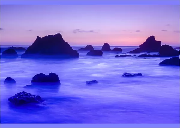 Sea stacks at dusk, El Matador State Beach, Malibu, California USA