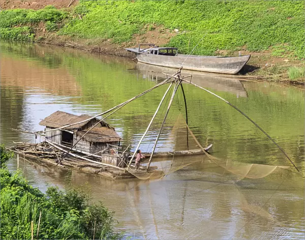 Kratie, Cambodia. Floating Vietnamese houseboat on the Mekong River in Kratie, Cambodia