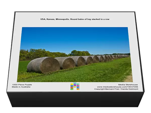 USA, Kansas, Minneapolis. Round bales of hay stacked in a row