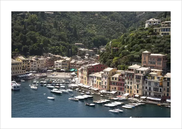 Italy, Genoa province, Portofino. Upscale fishing village on the Ligurian Sea, pastel
