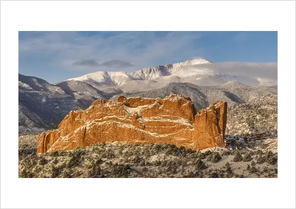 USA, Colorado, Garden of the Gods. Fresh snow on Pikes Peak and sandstone formation