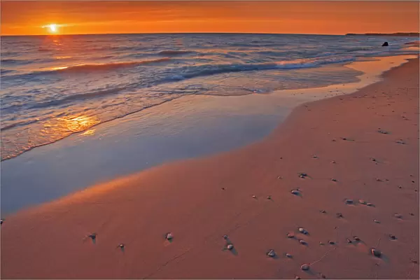 Canada, Ontario, Grand Bend. Sandy beach on Lake Huron at sunset