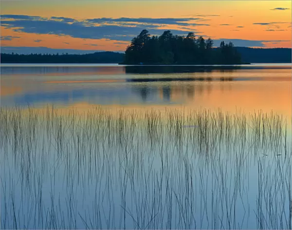 Canada, Quebec, Belleterre. Sunset reflection on Lac des Sables