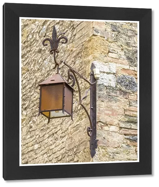 Europe, Italy, Chianti. Lamppost on the corner in the town of San Gimignano