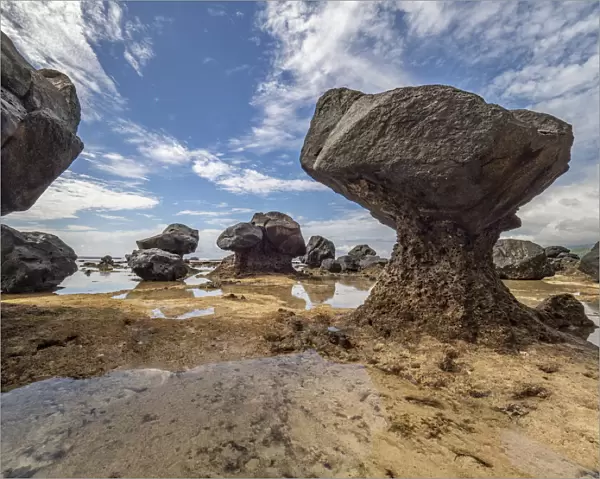 Fiji, Taveuni Island. Rock formations on the beach of Lavena showing erosion