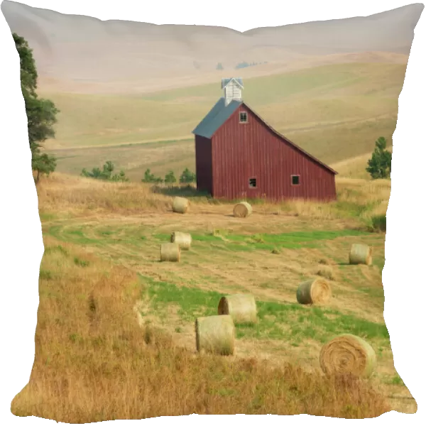 Red barn and wheat bales near Moscow, Idaho