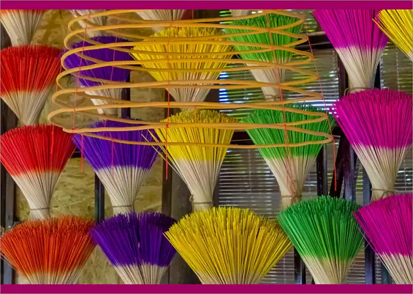 Vietnam. Colorful incense for sale
