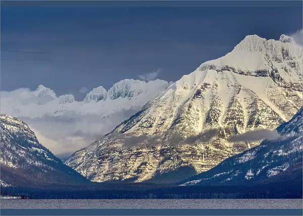 Winter on the Garden Wall and Cannon Mountain over Lake McDonald in Glacier National Park, Montana, USA