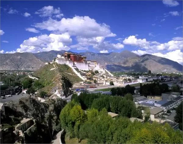 Potala Palace on mountain range from another mountain the home of the Dalai Lama