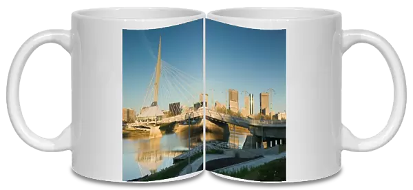 CANADA, Manitoba, Winnipeg: Esplanade Riel Pedestrian Bridge  /  Morning