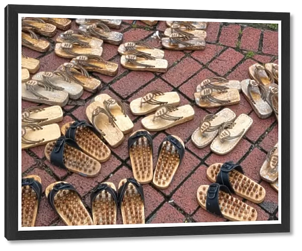 Malacca City, Malaysia, UNESCO Heritage City. Graphic pattern of shoes on floor