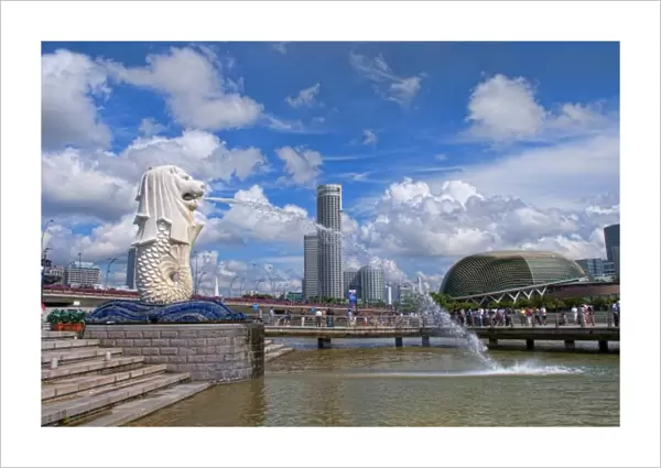 Merlion, symbol of Singapore, and downtown skyline in Fullerton area of Clarke Quay
