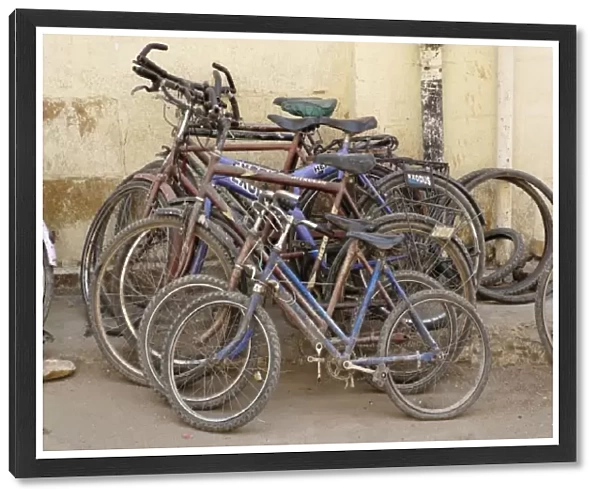 Bicycles parked against wall, Jaisalmer, India