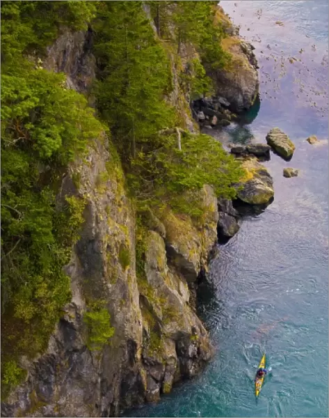 USA, Washington State, Puget Sound, Deception Pass. Aerial view of sea kayaker in