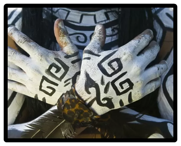 Mexico, Guerrero, Zihuatanejo. Young Man in Mayan Costume (MR) Decorated Hands