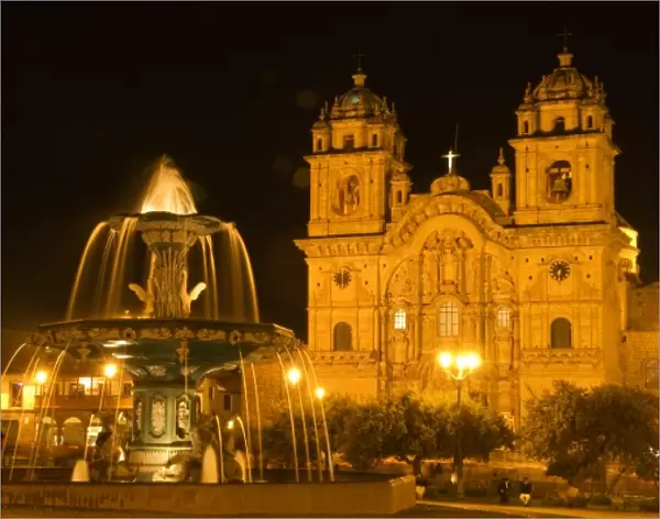 Peru, Cusco, Night view of fountain and Cathedral of Cusco, Plaza de Armas