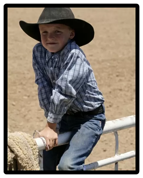 Santa Fe, New Mexico, USA. Galisteo Rodeo, young cowboy. (MR)