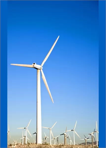 Palm Springs, CA, USA. View of wind turbines in the desert under a clear blue sky