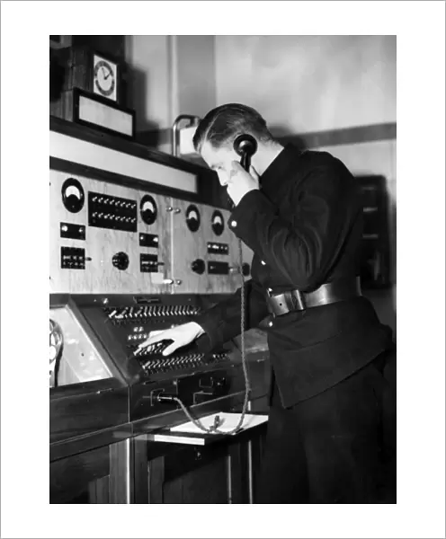 Man taking a call in a fire station control room