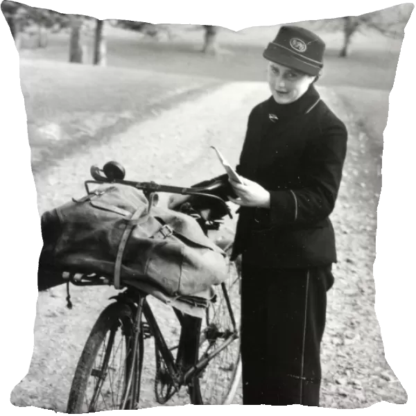 Lady postman with bike and letter bag, 22 March 1945