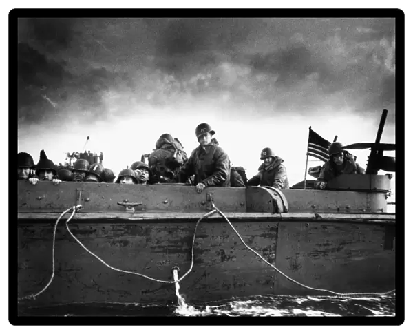 Soldiers on an American Coast Guard landing barge heading towards a Normandy beach on D-Day, 6 June 1944