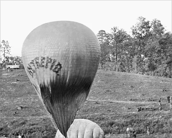 CIVIL WAR: BALLOON, 1862. Professor Thaddeus Sobieski Coulincourt Lowe inflating his reconnaissance balloon Intrepid on Gaines Hill, Virginia, shortly before the Battle of Fair Oaks during the American Civil War, May 1862. Photograph by Mathew Brady or one of his assistants