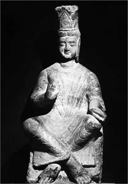 Seated stone figure of a bodhisattva, from the Yungang Grottoes, Shanxi province. Height: 51 in. Northern Wei, late 5th century A. D